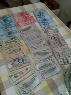 Policia y la DNCD ocupan dinero y armas de fuego de diferentes tipos en La Romana