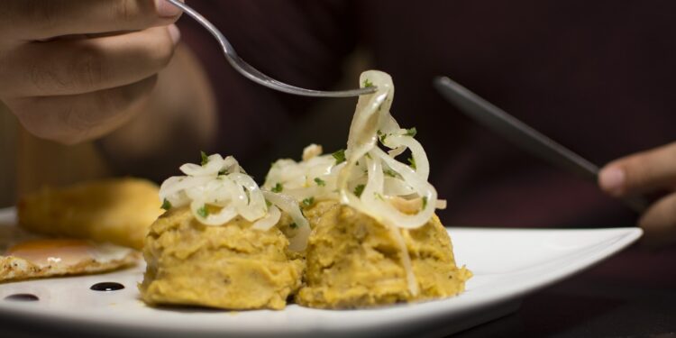 Como se logró la inclusión de la palabra mangú en la RAE