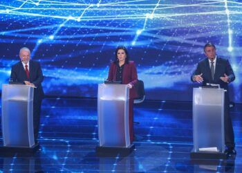 Primer debate de Lula y Bolsonaro lleva a los puños a dos de sus aliados  